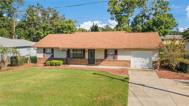 ranch-style house with brick siding, a garage, concrete driveway, and a front lawn