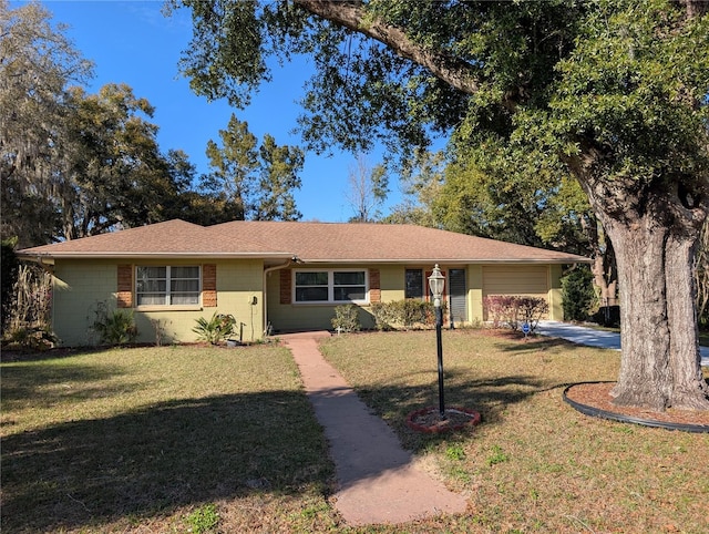 ranch-style house with a front yard