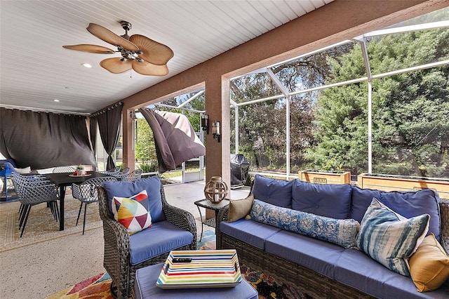 sunroom / solarium with ceiling fan