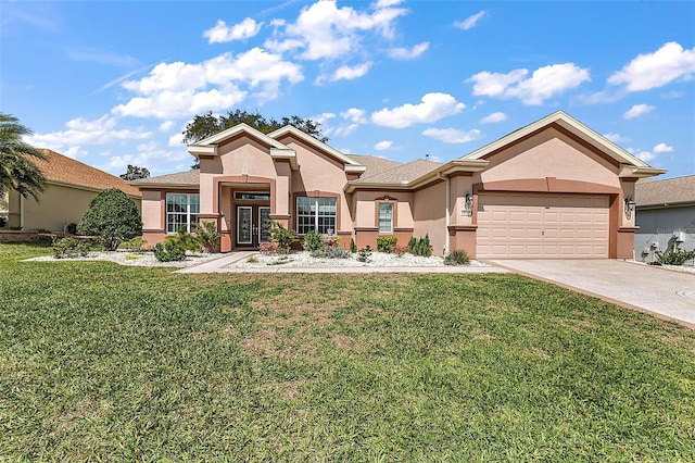 view of front of house with stucco siding, an attached garage, concrete driveway, and a front yard