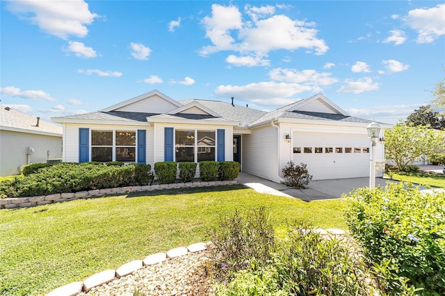 ranch-style house with a front yard, roof with shingles, and an attached garage