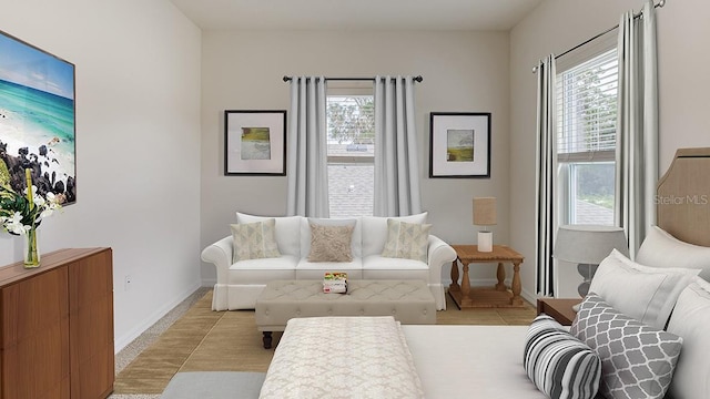 living room featuring baseboards and light tile patterned flooring