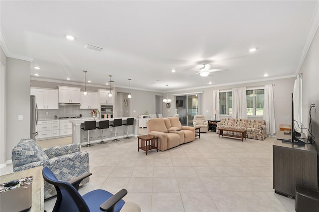 living area featuring visible vents, ornamental molding, recessed lighting, light tile patterned flooring, and a ceiling fan