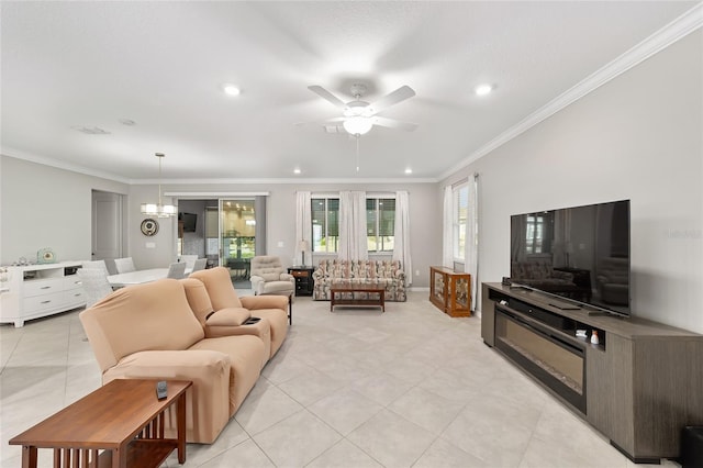 living area with recessed lighting, light tile patterned floors, ornamental molding, and ceiling fan with notable chandelier