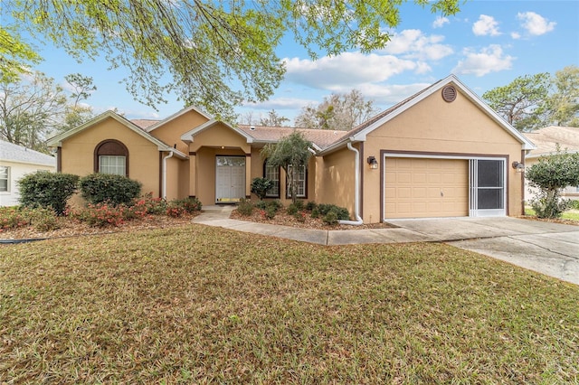 ranch-style house featuring a garage, concrete driveway, a front yard, and stucco siding