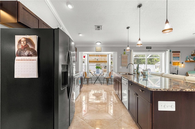 kitchen with visible vents, a sink, black fridge with ice dispenser, stainless steel dishwasher, and crown molding