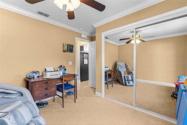 bedroom featuring visible vents, crown molding, carpet floors, a closet, and a ceiling fan