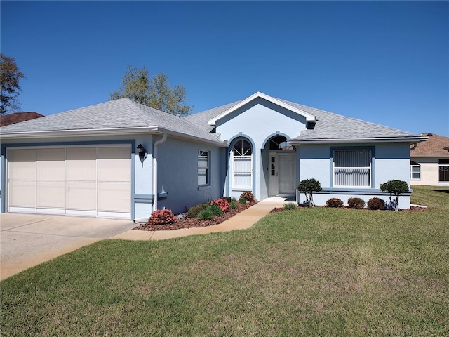 ranch-style home with roof with shingles, stucco siding, an attached garage, driveway, and a front lawn