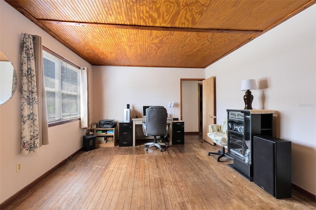 office space with hardwood / wood-style floors, wooden ceiling, and baseboards