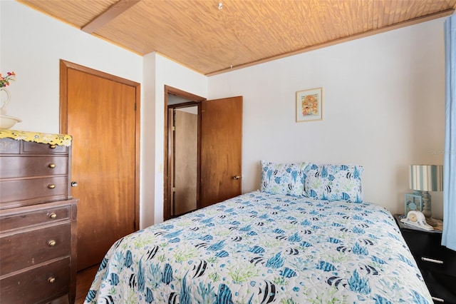 bedroom with wood ceiling