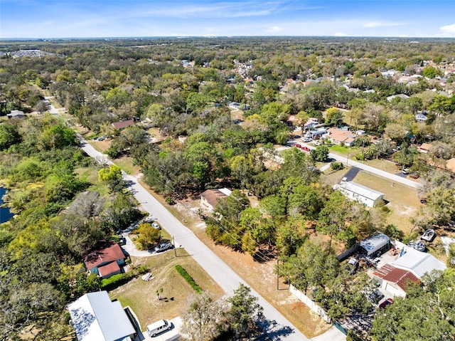 drone / aerial view with a forest view