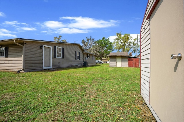 view of yard with central air condition unit