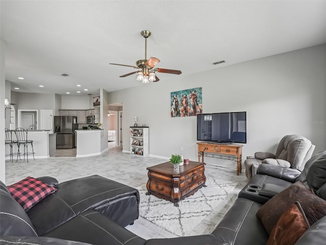 living area featuring baseboards, visible vents, a ceiling fan, marble finish floor, and recessed lighting