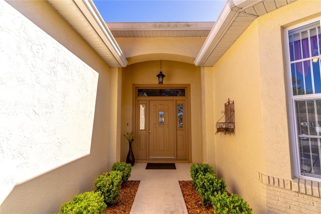 9458 SW 93rd Loop, Ocala, FL 34481 - property entrance with stucco siding