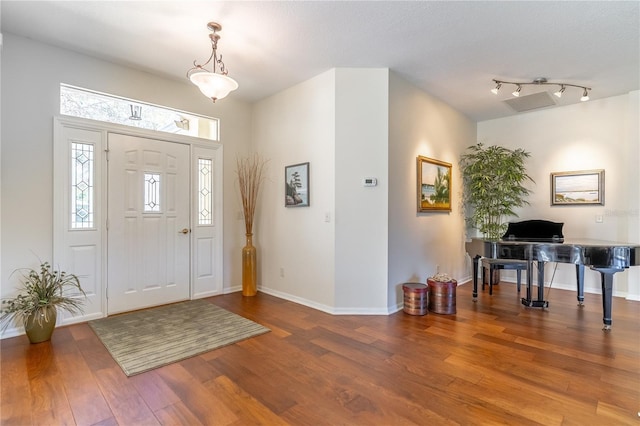 9458 SW 93rd Loop, Ocala, FL 34481 - foyer featuring wood finished floors and baseboards