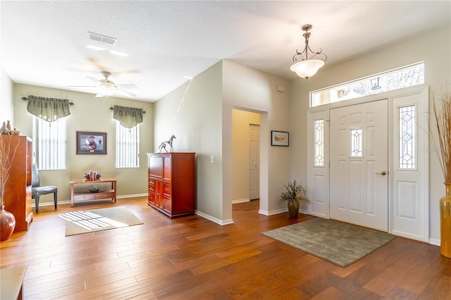9458 SW 93rd Loop, Ocala, FL 34481 - entrance foyer with wood finished floors and ceiling fan