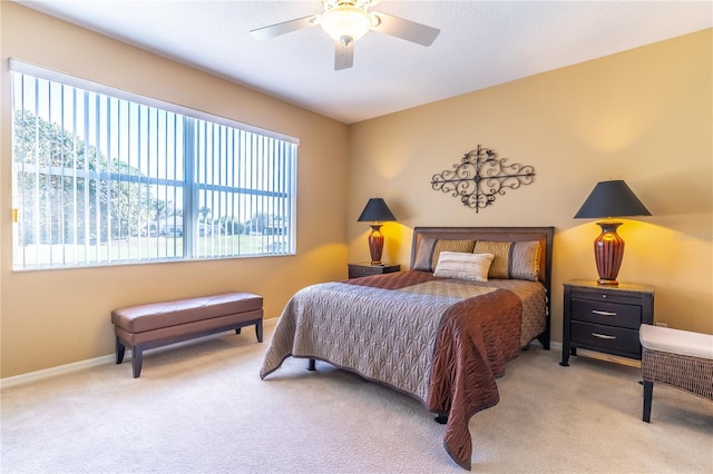 9458 SW 93rd Loop, Ocala, FL 34481 - bedroom featuring carpet flooring and a ceiling fan