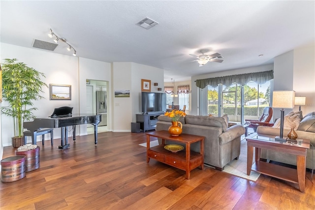 9458 SW 93rd Loop, Ocala, FL 34481 - living area with a ceiling fan, wood finished floors, and an office area