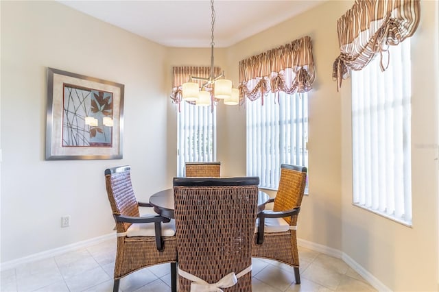 9458 SW 93rd Loop, Ocala, FL 34481 - dining space featuring a chandelier and light tile patterned floors