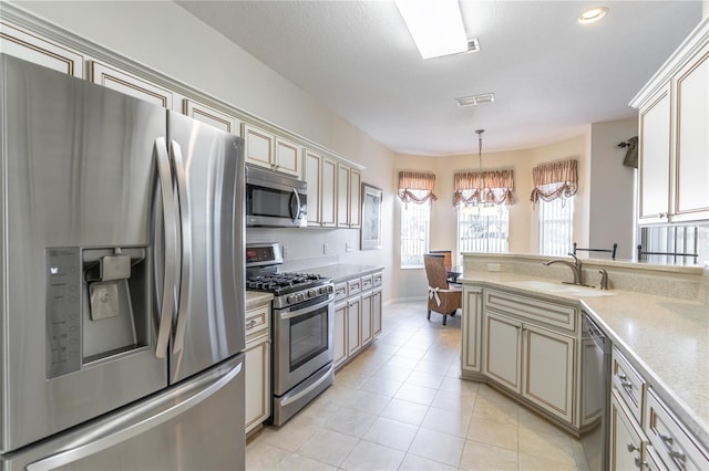9458 SW 93rd Loop, Ocala, FL 34481 - kitchen featuring appliances with stainless steel finishes, a chandelier, light countertops, decorative backsplash, and hanging light fixtures