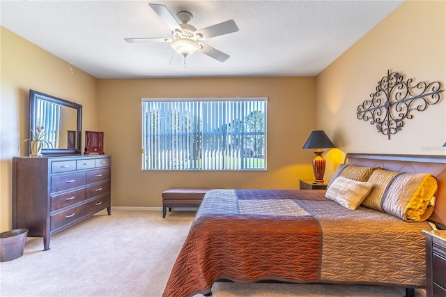 9458 SW 93rd Loop, Ocala, FL 34481 - bedroom with light colored carpet and a ceiling fan