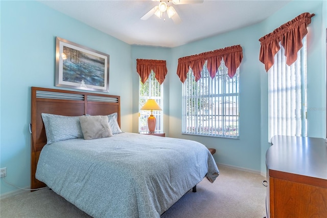 9458 SW 93rd Loop, Ocala, FL 34481 - bedroom featuring carpet flooring and a ceiling fan
