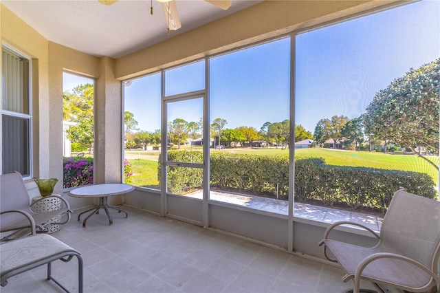 9458 SW 93rd Loop, Ocala, FL 34481 - sunroom with a ceiling fan