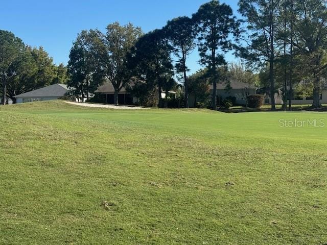 9458 SW 93rd Loop, Ocala, FL 34481 - view of grassy yard with view of golf course