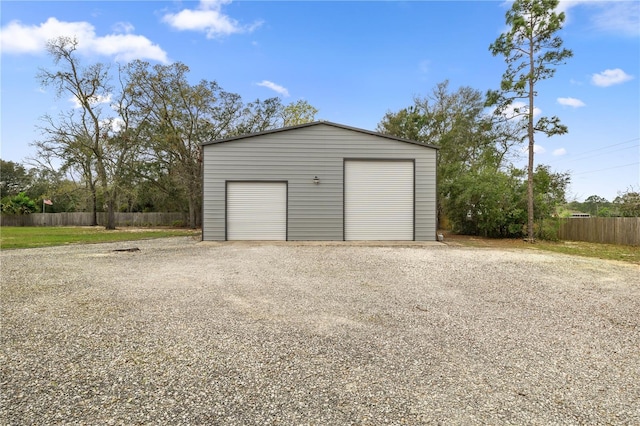 detached garage with fence