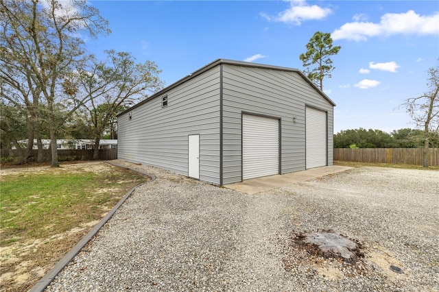 detached garage with fence