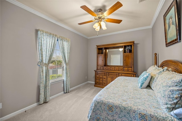 bedroom with light carpet, ceiling fan, crown molding, and baseboards