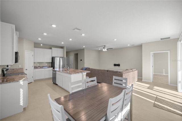 dining room featuring light tile patterned floors, recessed lighting, visible vents, and ceiling fan