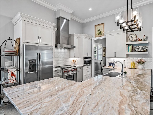 kitchen featuring light stone counters, open shelves, a sink, stainless steel appliances, and wall chimney range hood