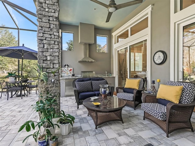 view of patio / terrace with area for grilling, outdoor dining space, glass enclosure, outdoor lounge area, and ceiling fan