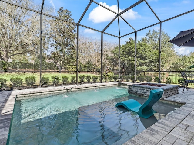 view of pool with a lanai, a fenced in pool, a hot tub, and a patio area