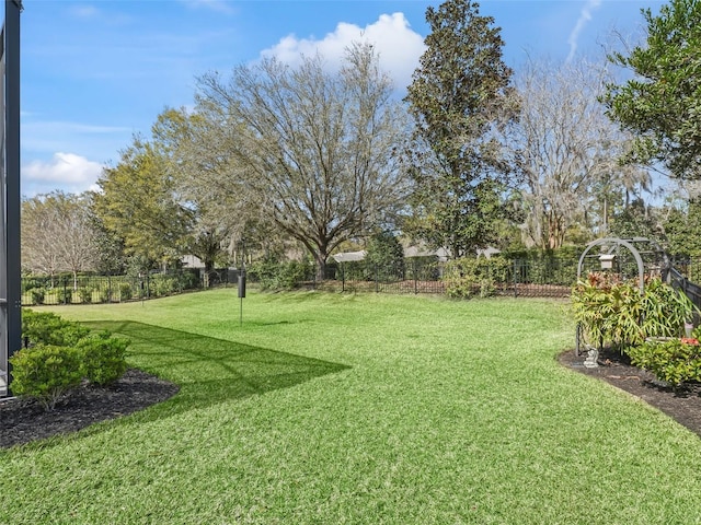 view of yard featuring fence