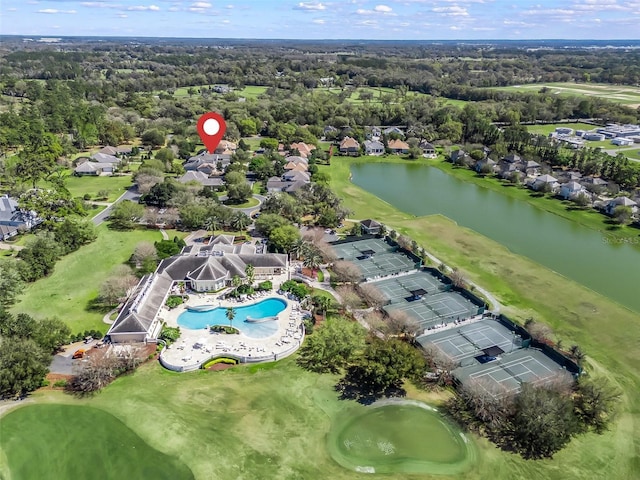 bird's eye view with a water view and golf course view