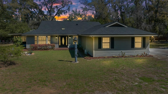 view of front of home featuring a front yard