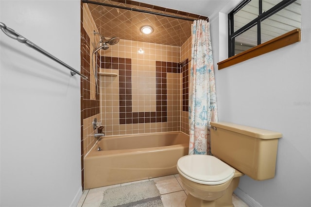 full bath featuring tile patterned floors, baseboards, toilet, and shower / bath combo