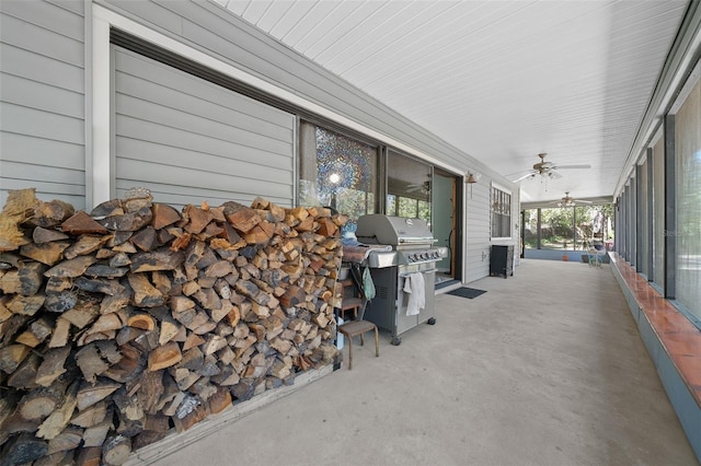 view of patio featuring a grill and ceiling fan