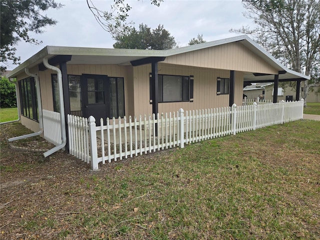 exterior space with a fenced front yard