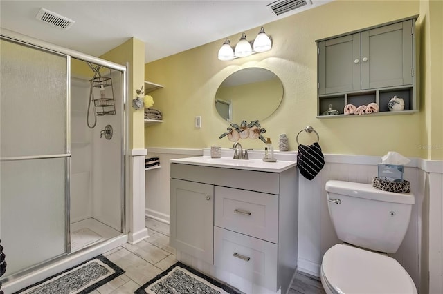 full bathroom with visible vents, a stall shower, and toilet