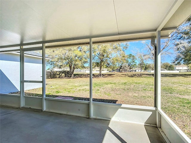 unfurnished sunroom featuring plenty of natural light