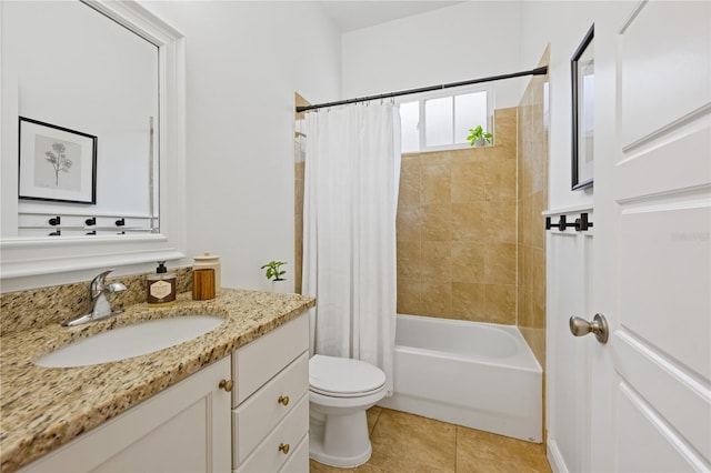 bathroom with shower / bath combo, toilet, vanity, and tile patterned floors