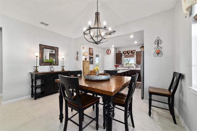 dining room with visible vents, recessed lighting, an inviting chandelier, light tile patterned floors, and baseboards