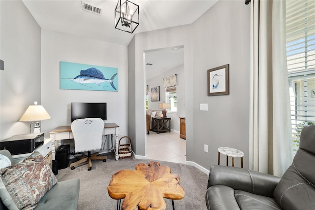 carpeted home office with a notable chandelier, visible vents, tile patterned floors, and baseboards