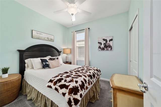 bedroom with a closet, baseboards, carpet, and a ceiling fan