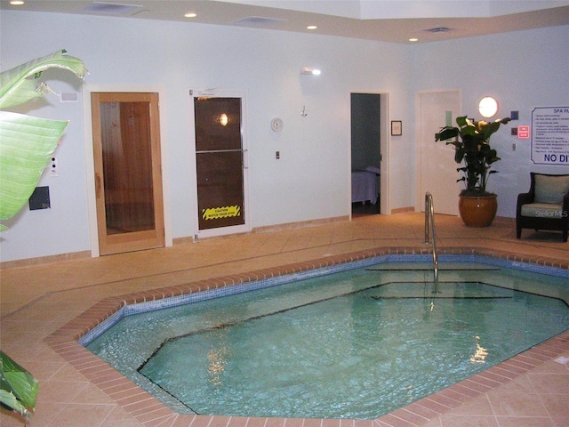 view of pool featuring an indoor hot tub and a pool