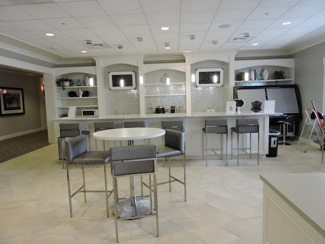 dining space with recessed lighting, baseboards, and ornamental molding