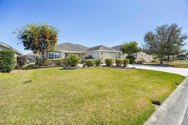 ranch-style house featuring a garage, concrete driveway, and a front yard